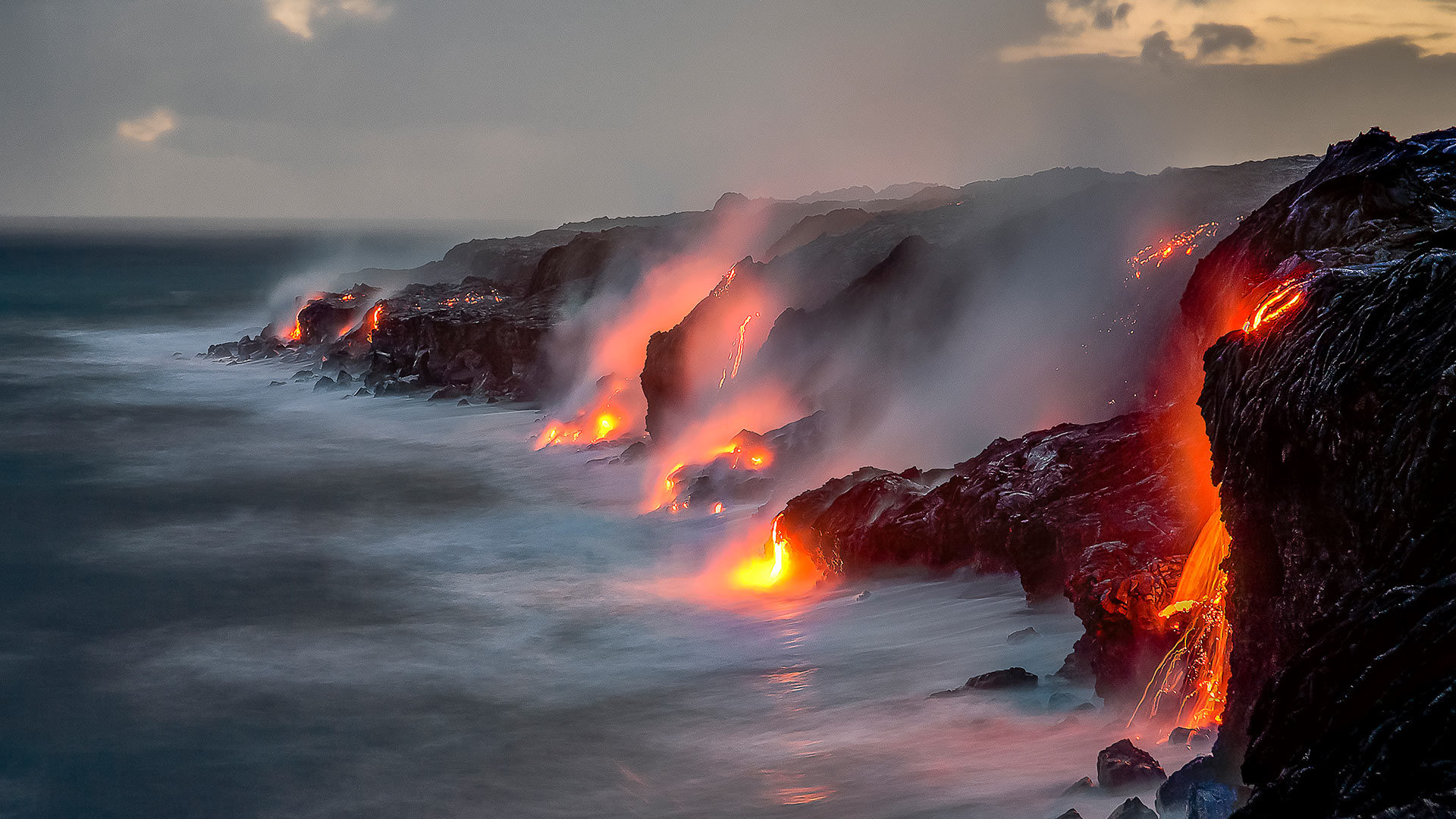 A series of lava flows spill into the ocean, Big Island, Hawaii, United States (© Ken McCurdy/Getty Images)