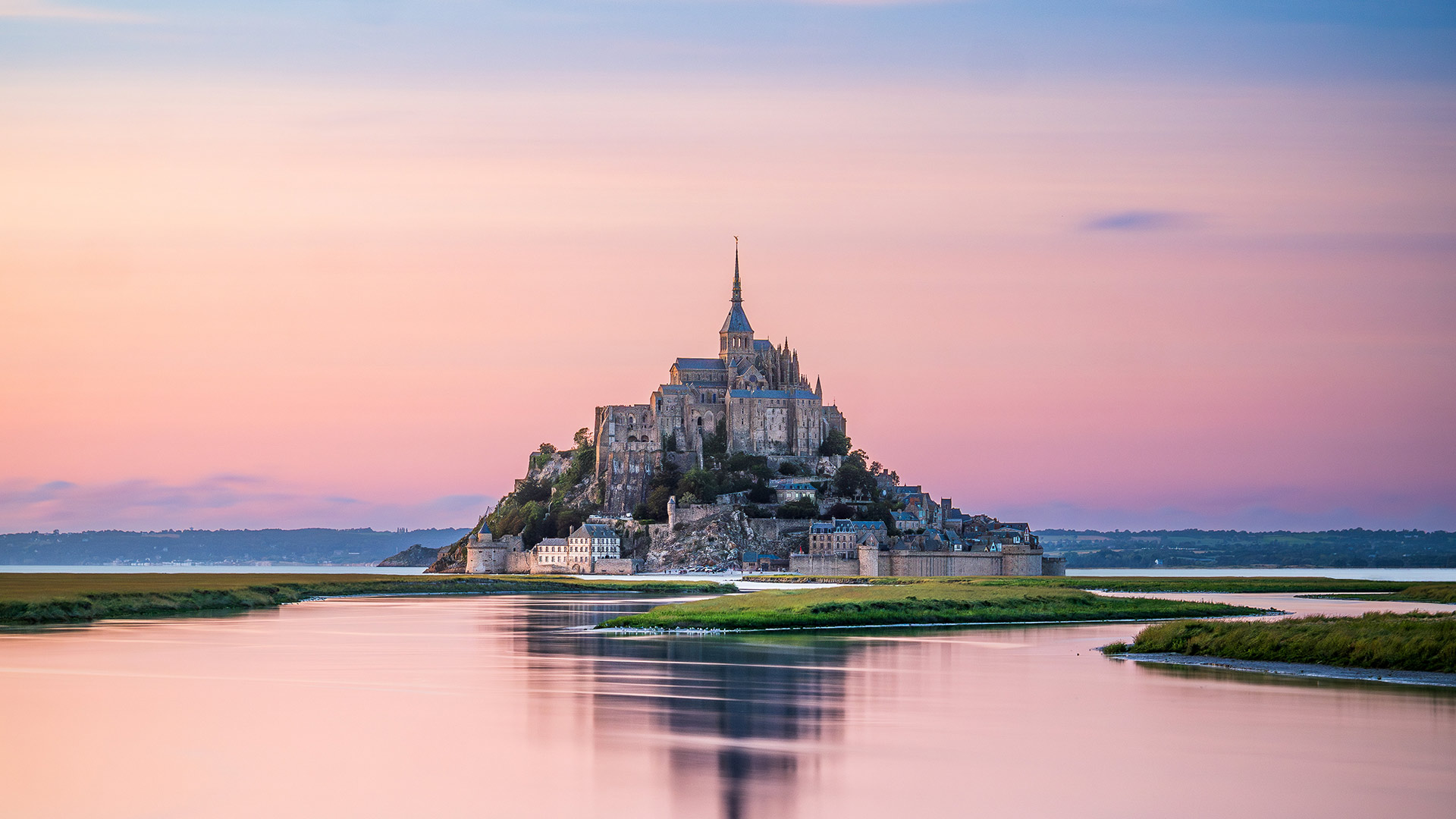 Mont-Saint-Michel during high tide, Manche, Normandy, France (© Clement LEONARD/Getty Images)